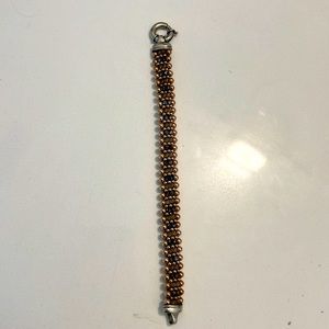 Dovera double sided rose gold and sterling hand beaded bracelet.